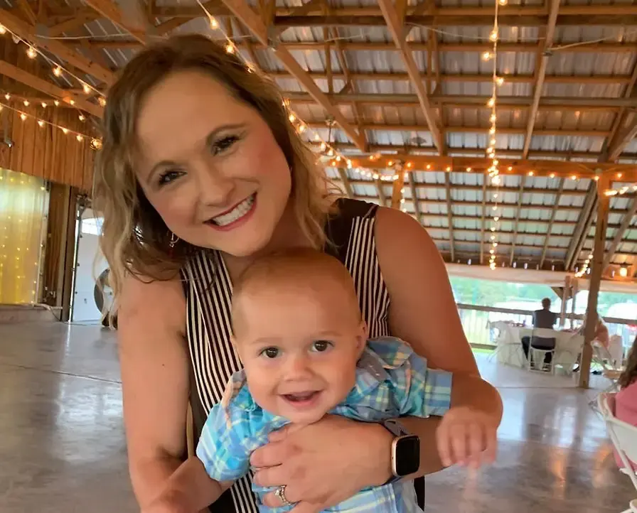 Brittani Sanford Smiling With Her Little Baby