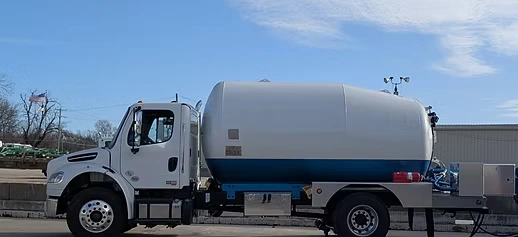 Tanker Truck Parked Under a Clear Blue Sky