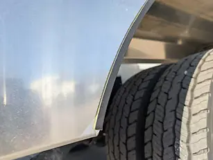 Close-up View of Truck Tire and Fender